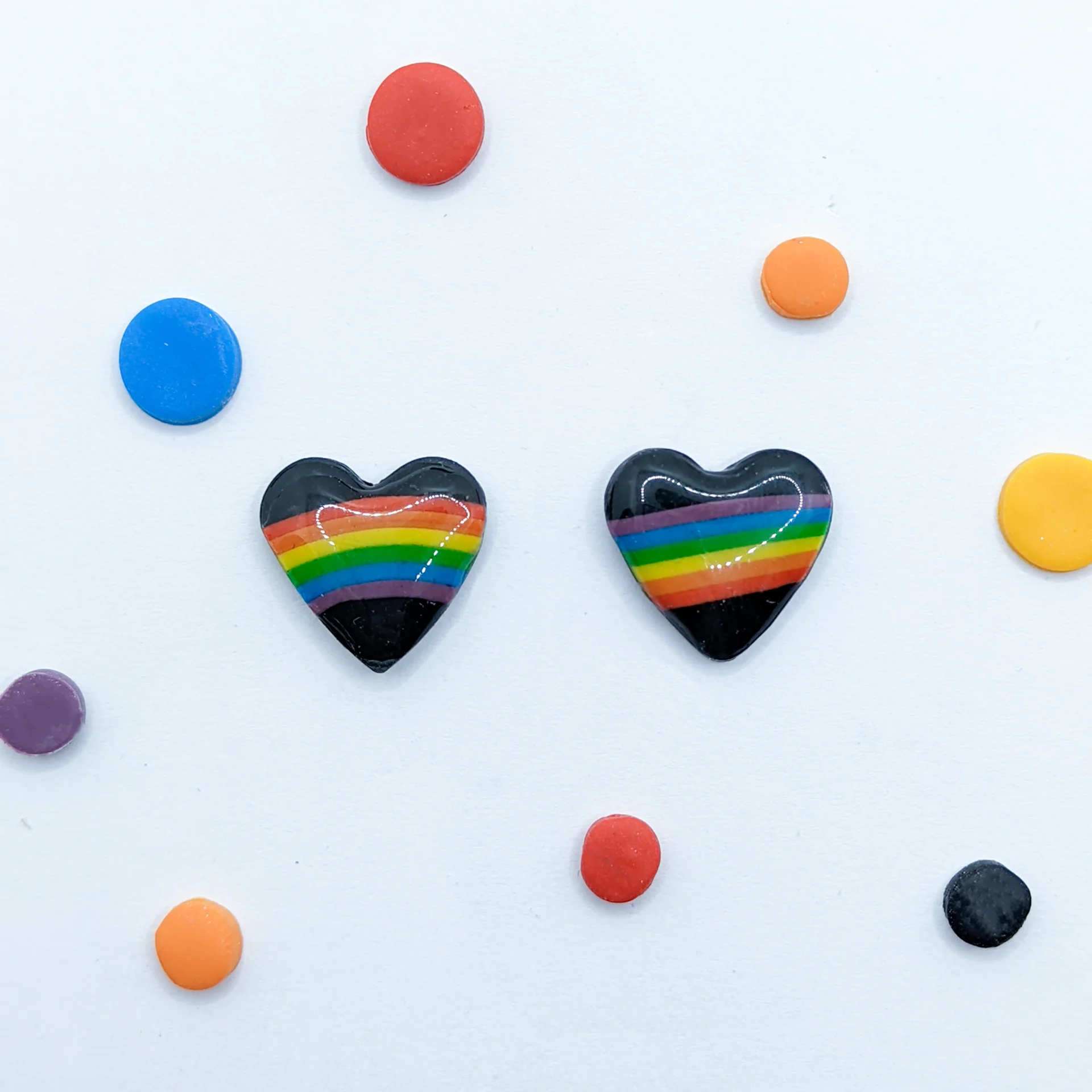 Pendientes orgullo corazon negro
